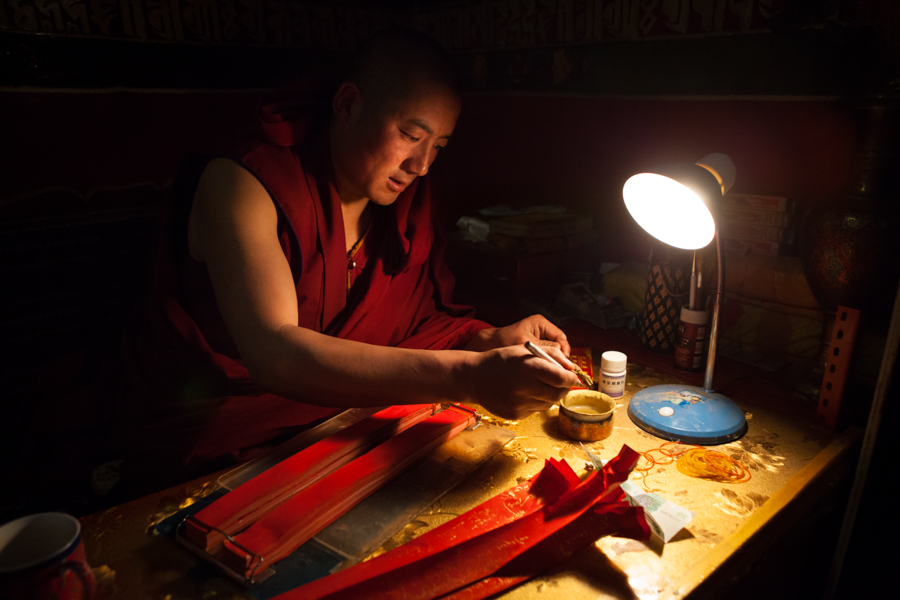 http://www.lauraportinaro.com/files/gimgs/69_tibetan-monk-writng-prayers.jpg